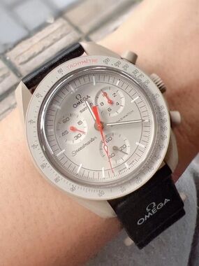 Swatch Ladies Silver Chronograph with Black Band and Red Accents